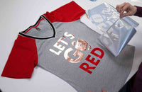 Gray and red shirt with heat transfer foil design