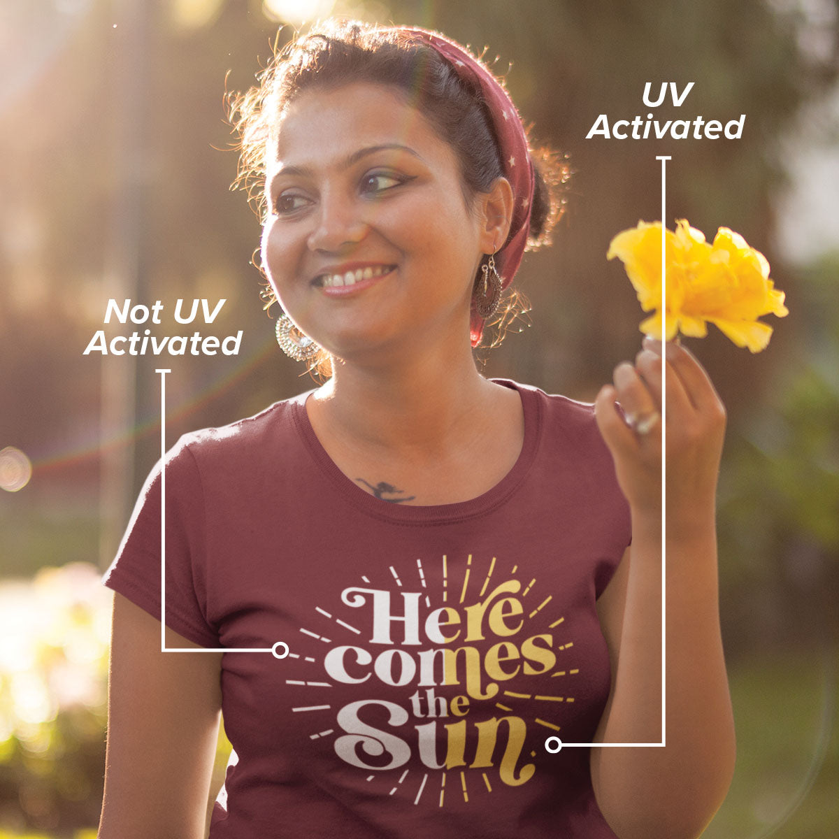 Woman wearing UV activated Here Comes the Sun shirt