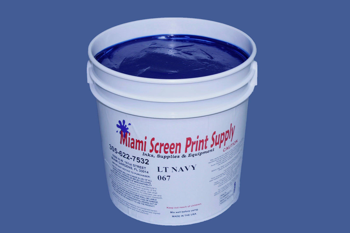 Image of a 5-gallon container of Light Navy 067 plastisol ink with a label displaying the color name and size. 